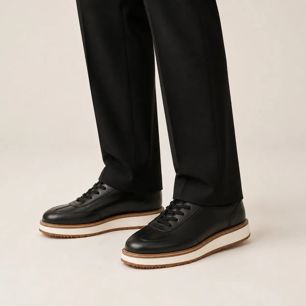 DIVINCH black leather lace-up platform shoes on foot in warm studio