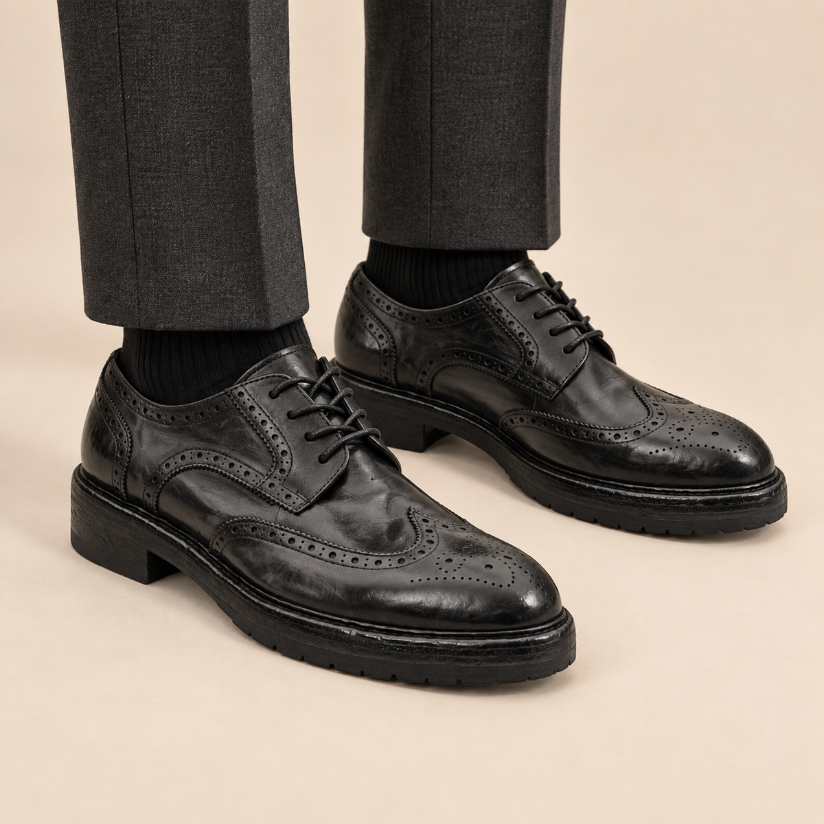 Black Glossy Treaded-Sole Wingtip Derby Shoe on-foot hero