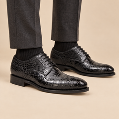 Black crocodile scale full wingtip Derby shoes on model lower legs - DIVINCH E832