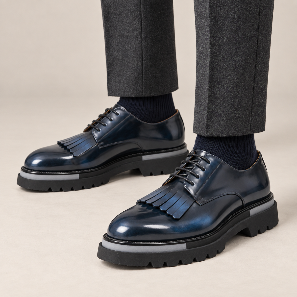 DIVINCH navy blue patina kiltie fringe Derby shoes worn with tailored charcoal trousers