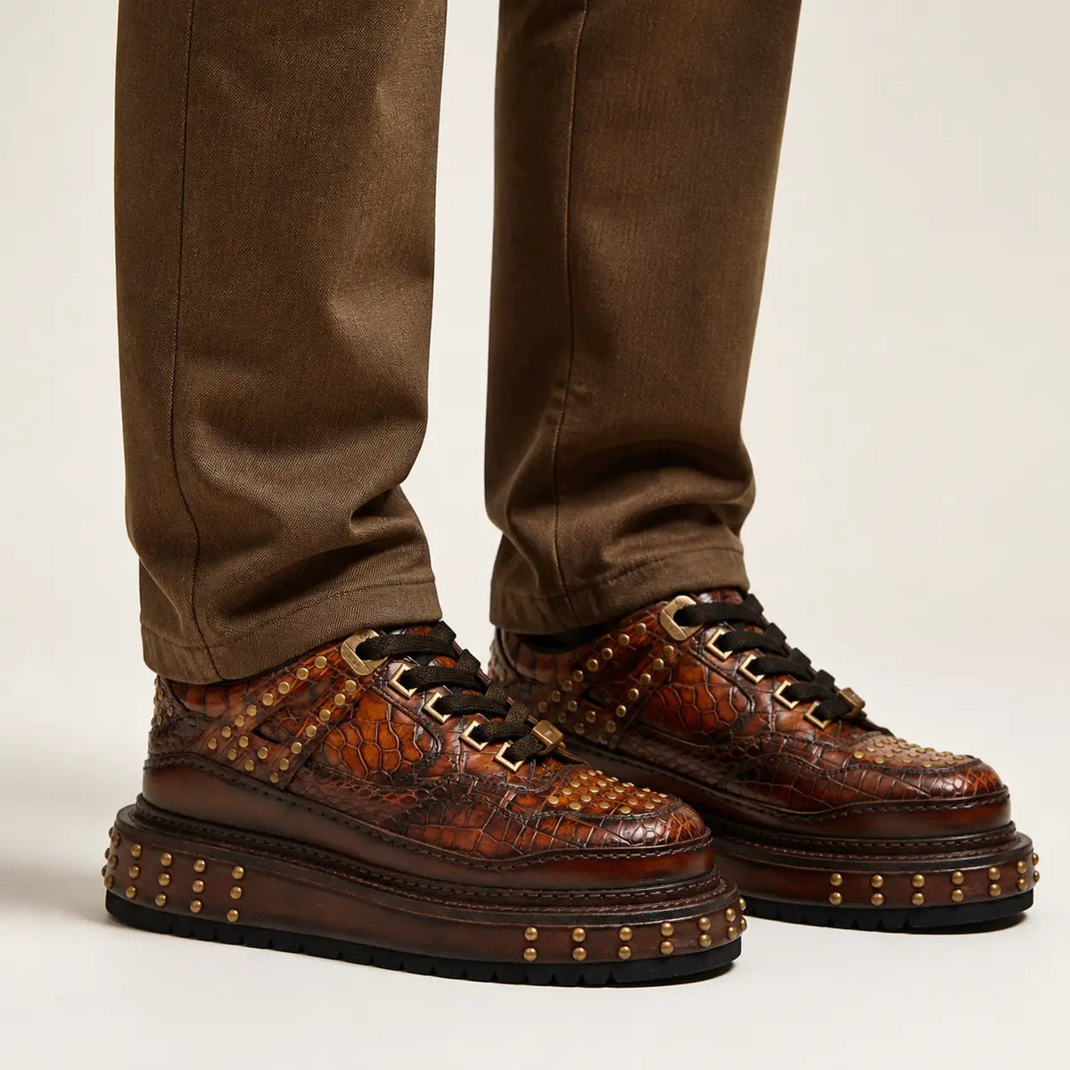 Brown Studded Crocodile Sneaker — on-foot studio view