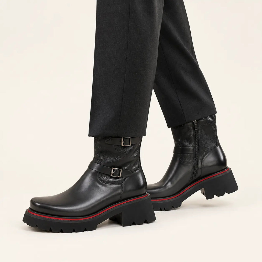 DIVINCH black double buckle platform boots on foot in warm studio