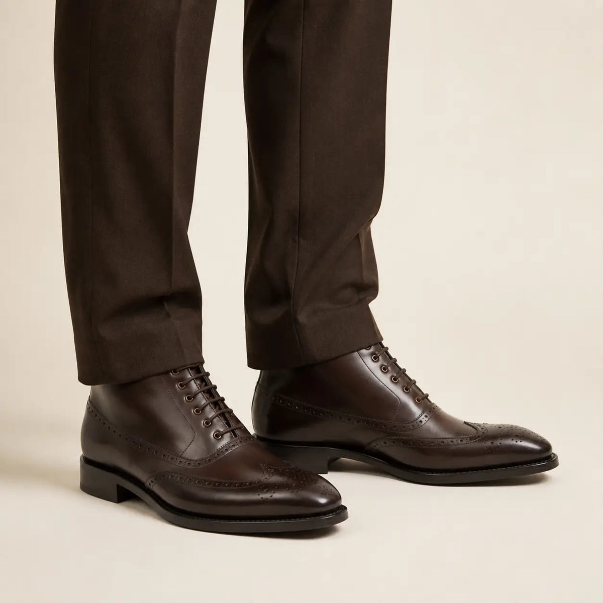 DIVINCH burnished leather lace-up boots — on-foot studio view