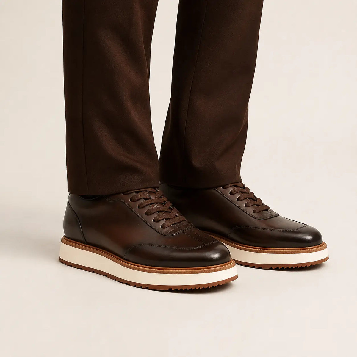 DIVINCH coffee leather lace-up platform shoes on foot in warm studio