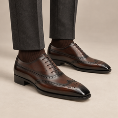 DIVINCH glossy dark brown wingtip Oxford shoes on foot