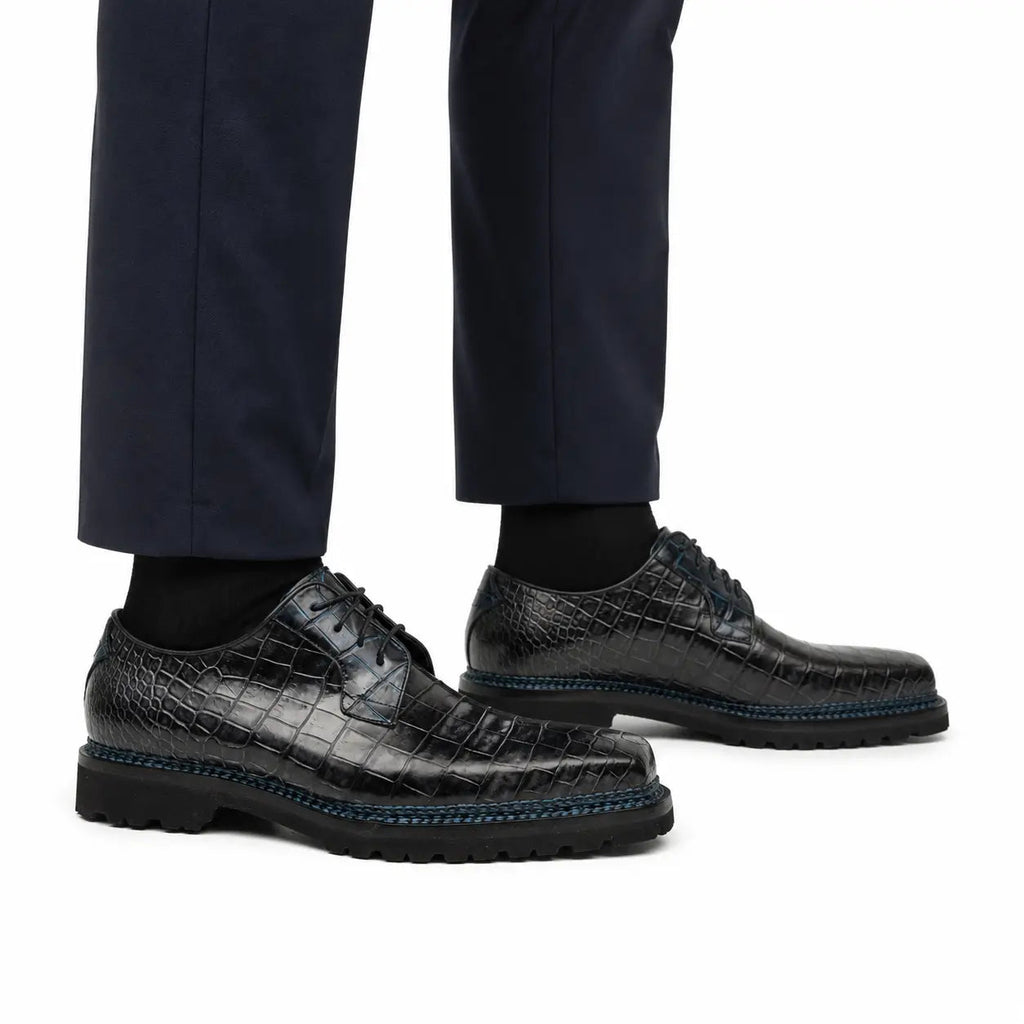 Midnight crocodile Derby shoes on foot