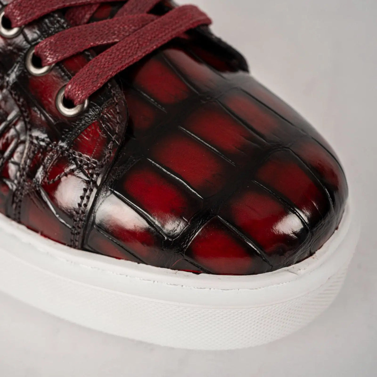 Burgundy and Black Glossy Textured Low-Top Sneaker