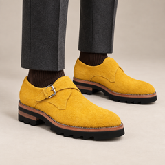 Mustard-yellow textured single monk shoes — on-foot studio view